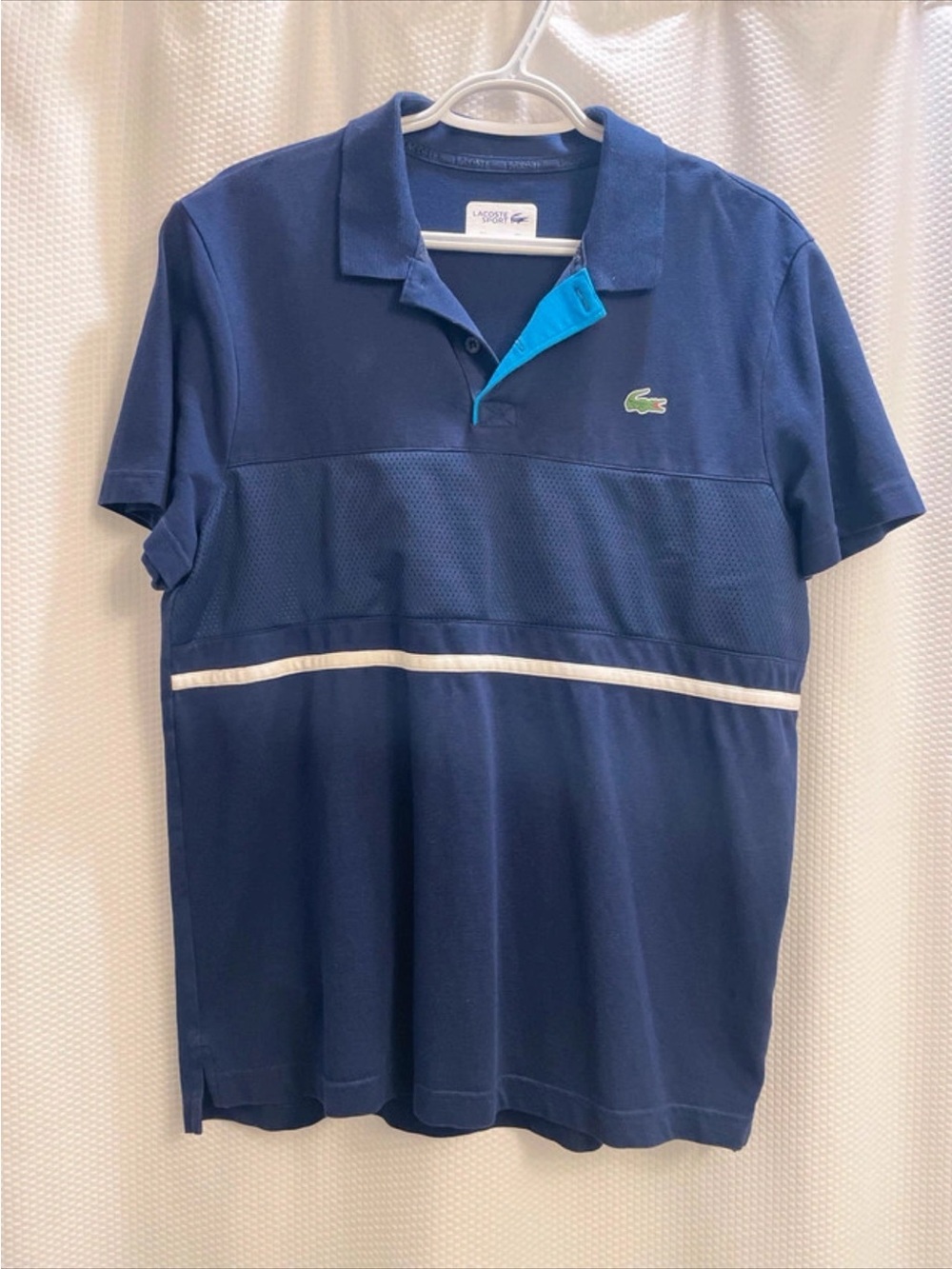 Lacoste Navy Polo with Light Blue Inner Placket and White Stripe